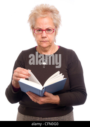 Middle-aged woman reading a book isolated on white background Stock Photo