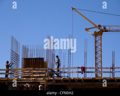 Construction workers at a construction site Stock Photo