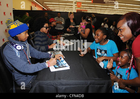 Ray Ray of Mindless Behavior signs autographs for fans during a meet and greet event held at a Kmart store in Miami Miami, Florida - 08.02.12 Stock Photo