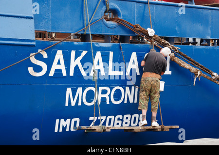 Painting name on fishing trawler Stock Photo