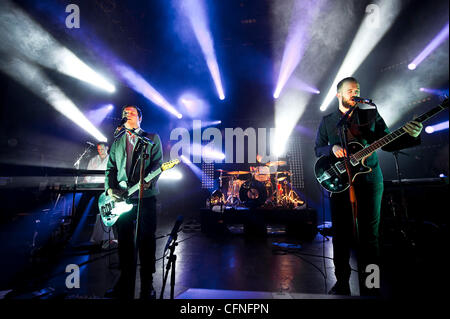 Harry McVeigh and Charles Cave of White Lies performing live at O2 Shepherd's Bush Empire. London, England - 10.02.11 Stock Photo