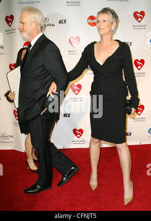 Pieter Jan Brugge and Jamie Lee Curtis 2011 MusiCares Person of the Year Tribute to Barbara Streisand held at the Los Angeles Convention Center Los Angeles, California - 11.02.11 Stock Photo