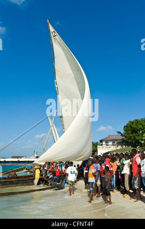 Spectators watching a regatta of &ldquo;Ngalawa&rdquo; traditional out-rigger