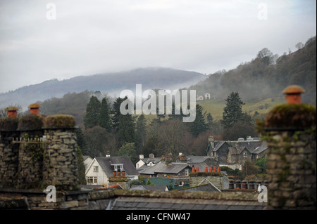 View across Ambleside on misty morning in The Lake District Cumbria UK Stock Photo