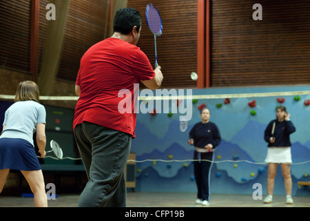 People playing a badminton game of doubles, Newmarket Suffolk UK Stock Photo