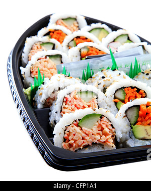 Japanese Style Sushi Boat With A Variety Of Sushi Rolls In A Plastic Container For Take Out Stock Photo