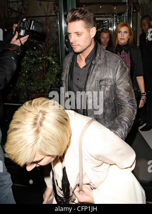 Boyzone star Keith Duffy out with his wife  Lisa Smith celebrating Valentine's night at the Ivy Club followed by Ronan Keating with his wife Yvonne Connolly London, England - 14.02.11 Stock Photo