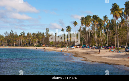 LUQUILLO, PUERTO RICO - People enjoying public beach. Stock Photo