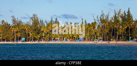 LUQUILLO, PUERTO RICO - People enjoying public beach. Stock Photo