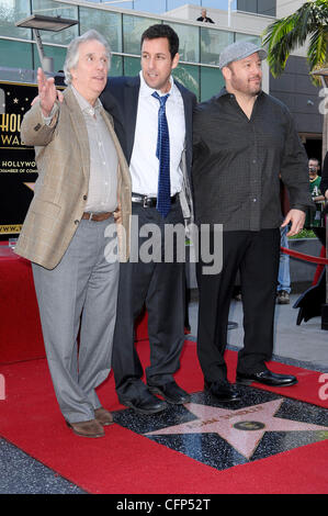 Henry Winkler, Adam Sandler and Kevin James Adam Sandler is honored on the Hollywood Walk of Fame and receives his star during a special ceremony in Hollywood. Los Angeles, California - 01.02.11 Stock Photo