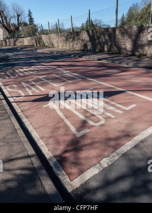 School safety zone road markings near primary school in Gloucestershire England UK. Stock Photo