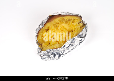 Cooked baked jacket yukon gold potato cut in half with melted butter wrapped in tin foil on white background cut out Stock Photo