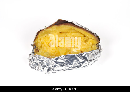 Cooked baked jacket yukon gold potato cut in half with melted butter wrapped in tin foil on white background cut out Stock Photo