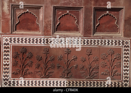 Red stone inlay work in Taj Mahal Stock Photo