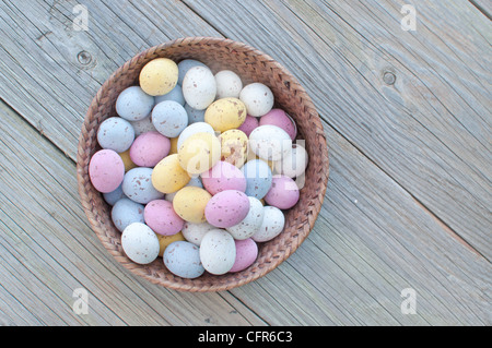 Mini chocolate easter eggs in a basket Stock Photo