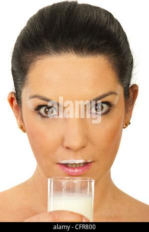 Close up of amazed woman with milk mustache after drinking milk isolated on white background Stock Photo