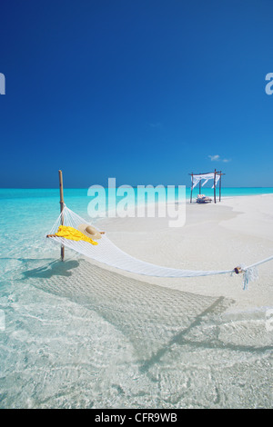 Hammock on tropical beach, Maldives, Indian Ocean, Asia Stock Photo