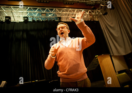 conductor TIM RHYS EVANS rehearsing the Only Kids Aloud children's choir  for a performance of Mahler's 8th Symphony, March 2012 Stock Photo