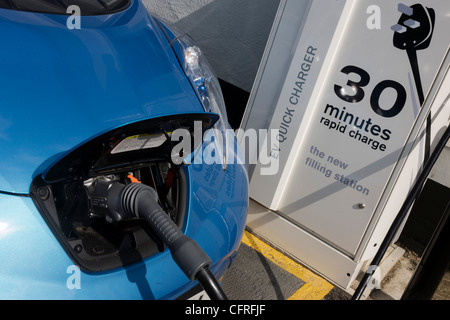 Fast charging a Nissan Leaf electric car at an electrical ... Fast charging a Nissan Leaf electric car at an electrical ...