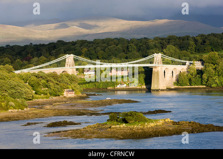 Historic Thomas Telford suspension bridge leading to the ancient castle ...