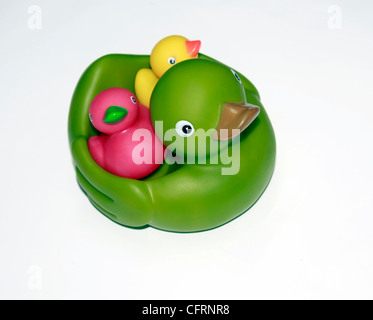 A cut out showing baby bath toys of a mother duck and ducklings Stock Photo