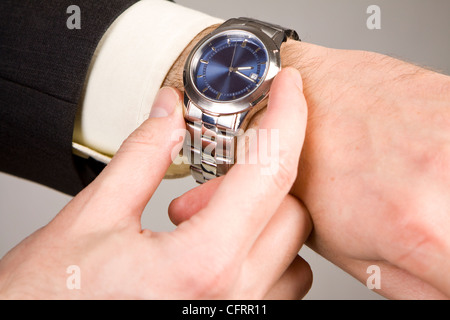 Hand ready to stop chronograph in a modern watch. Stock Photo