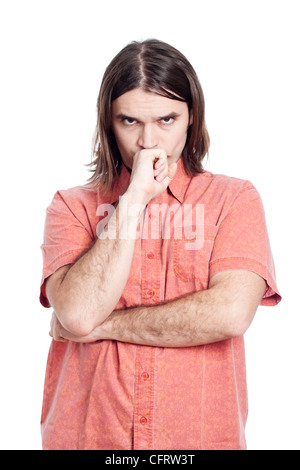 Young longhaired pensive man thinking, isolated on white background. Stock Photo