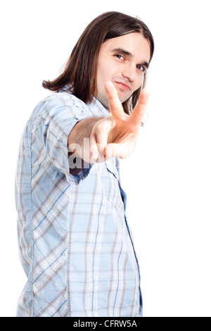 Young happy confident man gesturing v sign, isolated on white background. Stock Photo