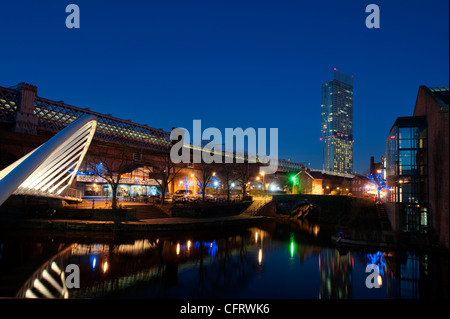 A night shot of canal at Castlefield, Manchester with Beetham Tower in the background. Stock Photo