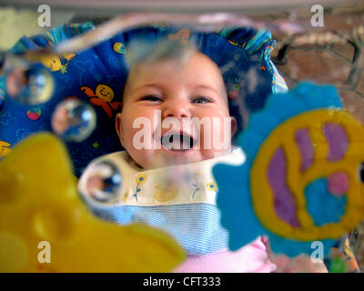 Dec 06, 2006; Los Angeles, CA, USA; A happy baby laying in her crib. Mandatory Credit: Photo by Olivier Pojzman/ZUMA Press. (©) Copyright 2006 by Olivier Pojzman Stock Photo