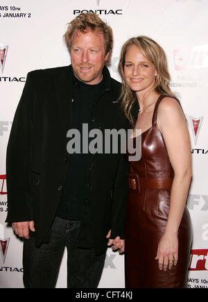Dec 9, 2006; Hollywood, California, USA; Actress HELEN HUNT & Producer MATTHEW CARNAHAN at the FX 'Dirt' Los Angeles Premiere held on the Paramount Studio Lot. Mandatory Credit: Photo by Lisa O'Connor/ZUMA Press. (©) Copyright 2006 by Lisa O'Connor Stock Photo