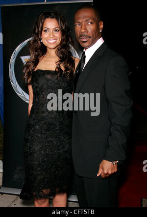 Dec 11, 2006; Beverly Hills, California, USA; Actor EDDIE MURPHY & TRACEY EDMONDS arrives at the 'Dreamgirls' Los Angeles Premiere held at the Wilshie Theatre. Mandatory Credit: Photo by Lisa O'Connor/ZUMA Press. (©) Copyright 2006 by Lisa O'Connor Stock Photo