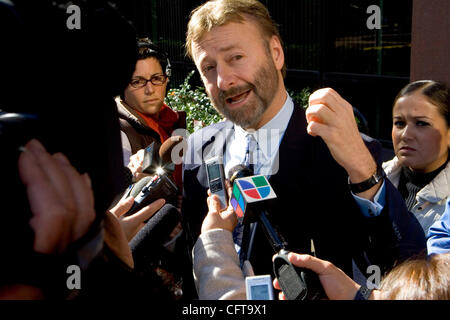 December 20, 2006, San Diego, CA EUGENE IREDALE (CQ), center, who represents ARTURO VILLAREAL HEREDIA, speaks to members of the press outside Federal Court in downtown San Diego where HEREDIA and JAVIER ARRELANO FELIX were arraigned Wednesday morning on charges that FELIX controlled drug trafficking Stock Photo