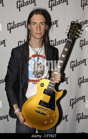 January 20, 2007; Anaheim, CA, USA; Musician JASON 'SLIM' GAMBILL in the Gibson Guitar Corporation's booth at The NAMM Show '07. Mandatory Credit: Photo by Vaughn Youtz/ZUMA Press. (©) Copyright 2007 by Vaughn Youtz. Stock Photo