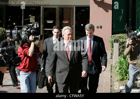 February 14, 2007 San Diego California USA---KYLE 'DUSTY' FOGGO (striped tie) left Federal Court in San Diego where he was arraigned on fraud and conspiracy charges along with BRENT WILKES in connection with former congressman RANDY 'DUKE' CUNNINGHAM.  WILKES AND FOGGO are childhood friends who grew Stock Photo