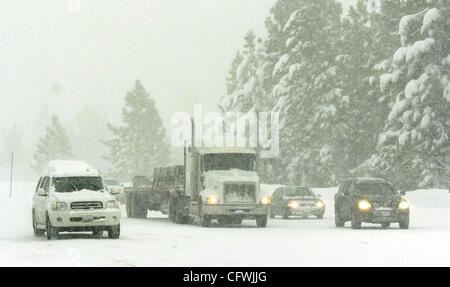 Traffic makes its way westbound through a heavy storm in the Sierra Nevada on Interstate 80 in Nyack, Calif., on Monday February 26, 2007.  The storm, which brought with it 24 inches of snow on Sunday, slowed down motorists coming back to the Bay Area at the end of the weekend.   (Nader Khouri/Contr Stock Photo