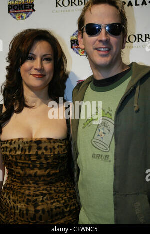 03-01-2007  JENNIFER TILLY & PHIL LAAK @ Caesars Palace Hotel & Casino in front of the  Pure Nighclub in Las Vegas, Nevada for the Red Carpet for the 3 rd Nationa Heads -up Poker Championship 64 pf the Worls best poker players competing in a series of Heads Up Texas Hold'em matches. Celebrity Attend Stock Photo