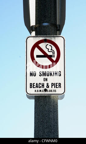 Mar 04, 2007 - Huntington Beach, CA, USA - Huntington Beach is a seaside city in Orange County in southern California and is also one of the first California cities to ban cigarette smoking on its beaches.  Activists in favor of the ban say it reduces refuse (cigarette butts) on the sand and in the  Stock Photo