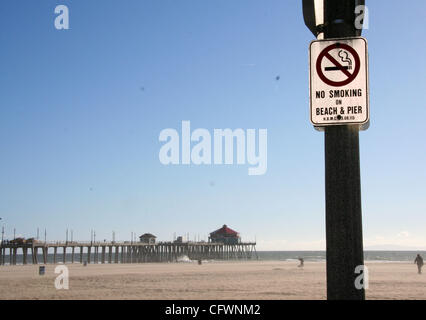 Mar 04, 2007 - Huntington Beach, CA, USA - Huntington Beach is a seaside city in Orange County in southern California and is also one of the first California cities to ban cigarette smoking on its beaches.  Activists in favor of the ban say it reduces refuse (cigarette butts) on the sand and in the  Stock Photo