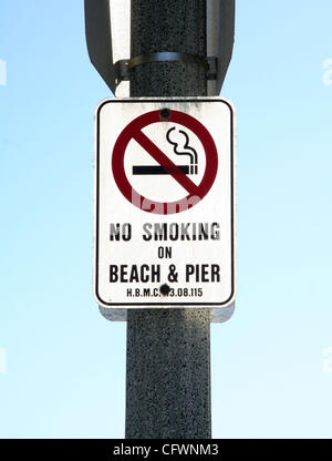 Mar 04, 2007 - Huntington Beach, CA, USA - Huntington Beach is a seaside city in Orange County in southern California and is also one of the first California cities to ban cigarette smoking on its beaches.  Activists in favor of the ban say it reduces refuse (cigarette butts) on the sand and in the  Stock Photo