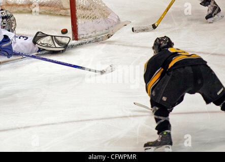 RENEE JONES SCHNEIDER ¥ reneejones@startribune.com.Minneapolis, MN - March 3, 2007 - Burnsville's Adam Pearson shot the puck past Holy Angel's goalie Michael Webb in the second period of the section 5 finals Saturday at Mariucci Arena at the University of Minnesota.   (Credit Image: Â© Minneapolis S Stock Photo