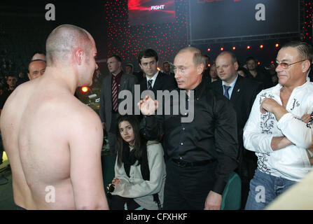 Russian President Vladimir Putin and actor Jean-Claude Van Damme at the fight tournament in St.Petersburg. Stock Photo