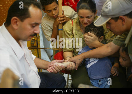 Samaan El Kharaz cave church, also known as Church of St Ibram Ibn Zaraa El Soriany, Moqattam, Cairo, Egypt. It is a common practice for Coptic Christians to have their children tattoed with the 'marks of Christ. The church in Moqattam, Cairo is made up of 3 sets of caves. The largest one is said to Stock Photo