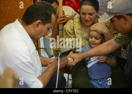 Samaan El Kharaz cave church, also known as Church of St Ibram Ibn Zaraa El Soriany, Moqattam, Cairo, Egypt. It is a common practice for Coptic Christians to have their children tattoed with the 'marks of Christ. The church in Moqattam, Cairo is made up of 3 sets of caves. The largest one is said to Stock Photo