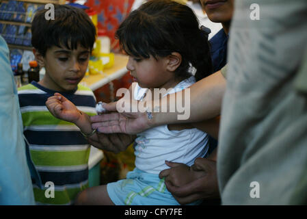 Samaan El Kharaz cave church, also known as Church of St Ibram Ibn Zaraa El Soriany, Moqattam, Cairo, Egypt. It is a common practice for Coptic Christians to have their children tattoed with the 'marks of Christ. The church in Moqattam, Cairo is made up of 3 sets of caves. The largest one is said to Stock Photo