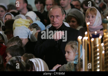 Vladimir Putin at the Orthodox Christmas church service in Novo- Jerusalem(Novoerusalimski) Voskresenski monastery near Moscow. Stock Photo