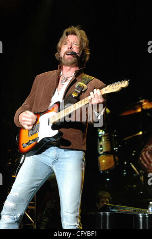 Kix Brooks and Ronnie Dunn of Brooks and Dunn perform onstage during ...