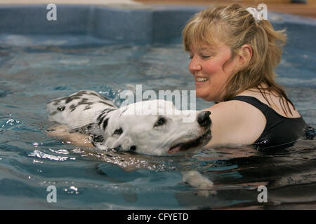 May 16, 2007, Oceanside, California, USA ALISON WHITE is the owner of The Total Dog Canine Swim Center in Oceanside.  She was giving 'swim therapy' to 'Beamer' (who belongs to Ken Slaughter) in her 95-degree indoor pool.  Beamer suffers from arthritis in his rear legs.   Mandatory Credit: photo by S Stock Photo