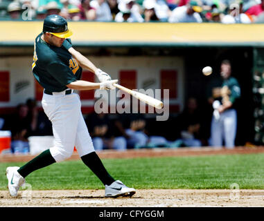 Oakland Athletics' Bobby Crosby connects a solo homerun off Kansas City Royals' starting pitcher Scott Elarton during the second inning at McAfee Coliseum in Oakland, Calif., on Thursday May 17, 2007.(Ray Chavez/The Oakland Tribune) Stock Photo