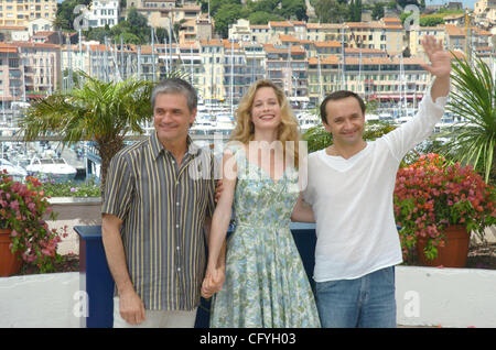 Konstantin Lavronenko, Maria Bonnevie and director Andrei Zviaguintsev at the 2007 Cannes festival. Stock Photo